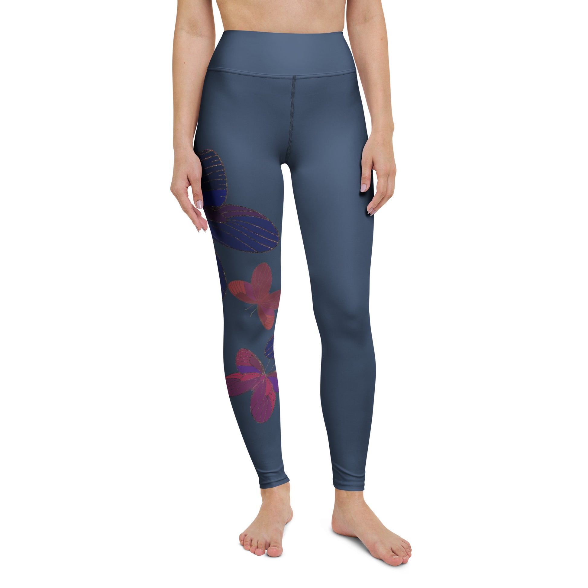 front view of model wearing blue grey butterfly yoga pants leggings