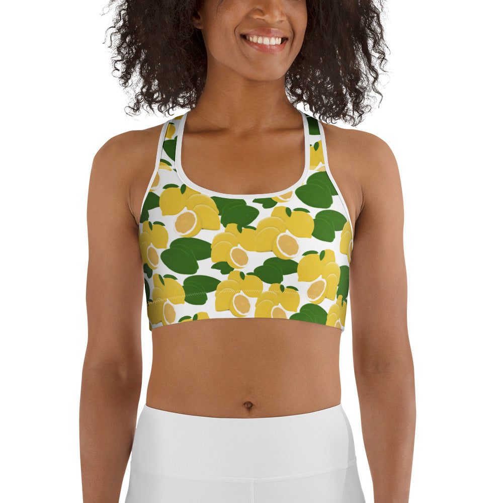  front view of model wearing citrus lemon sports bra in white