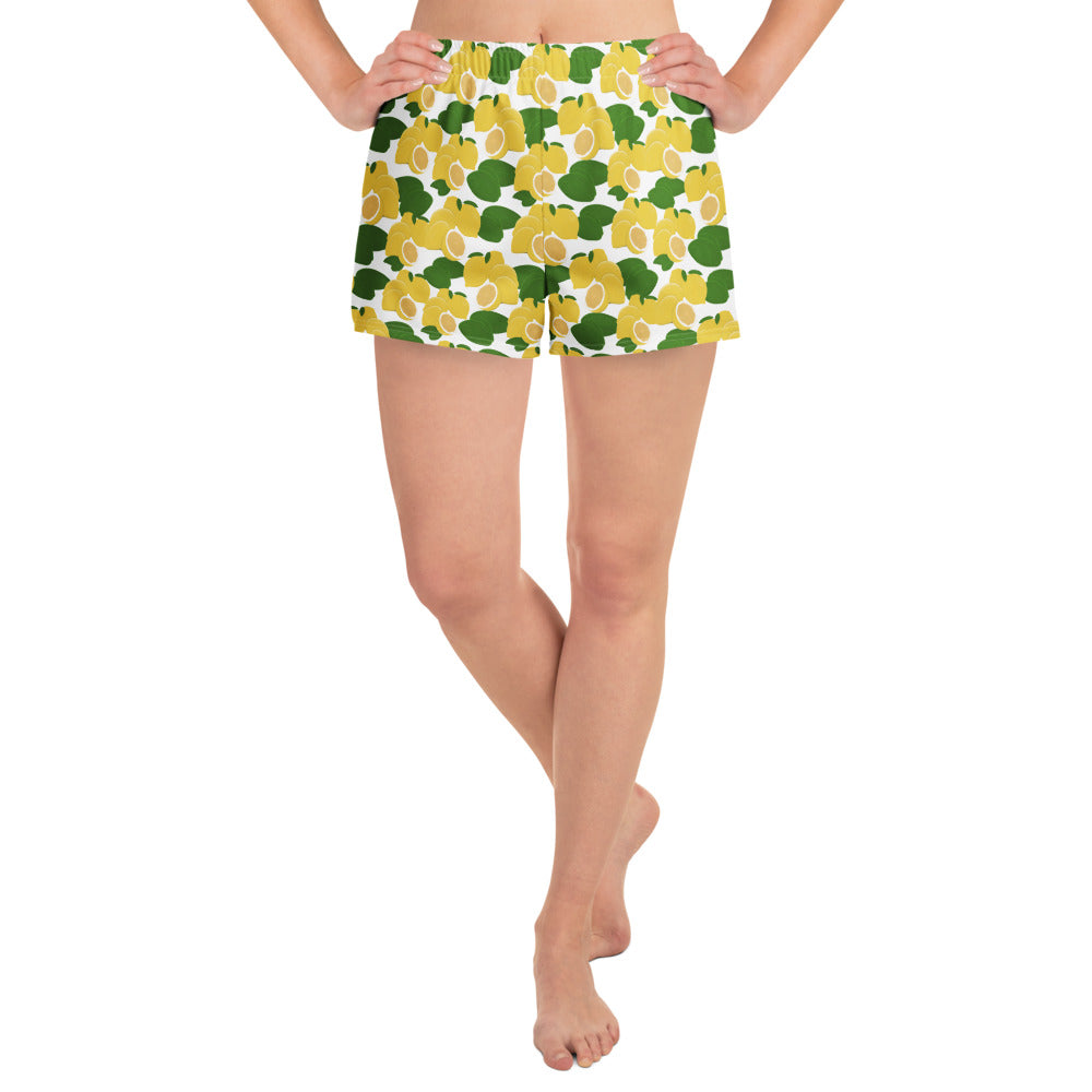 front view of model wearing citrus lemon swim shorts