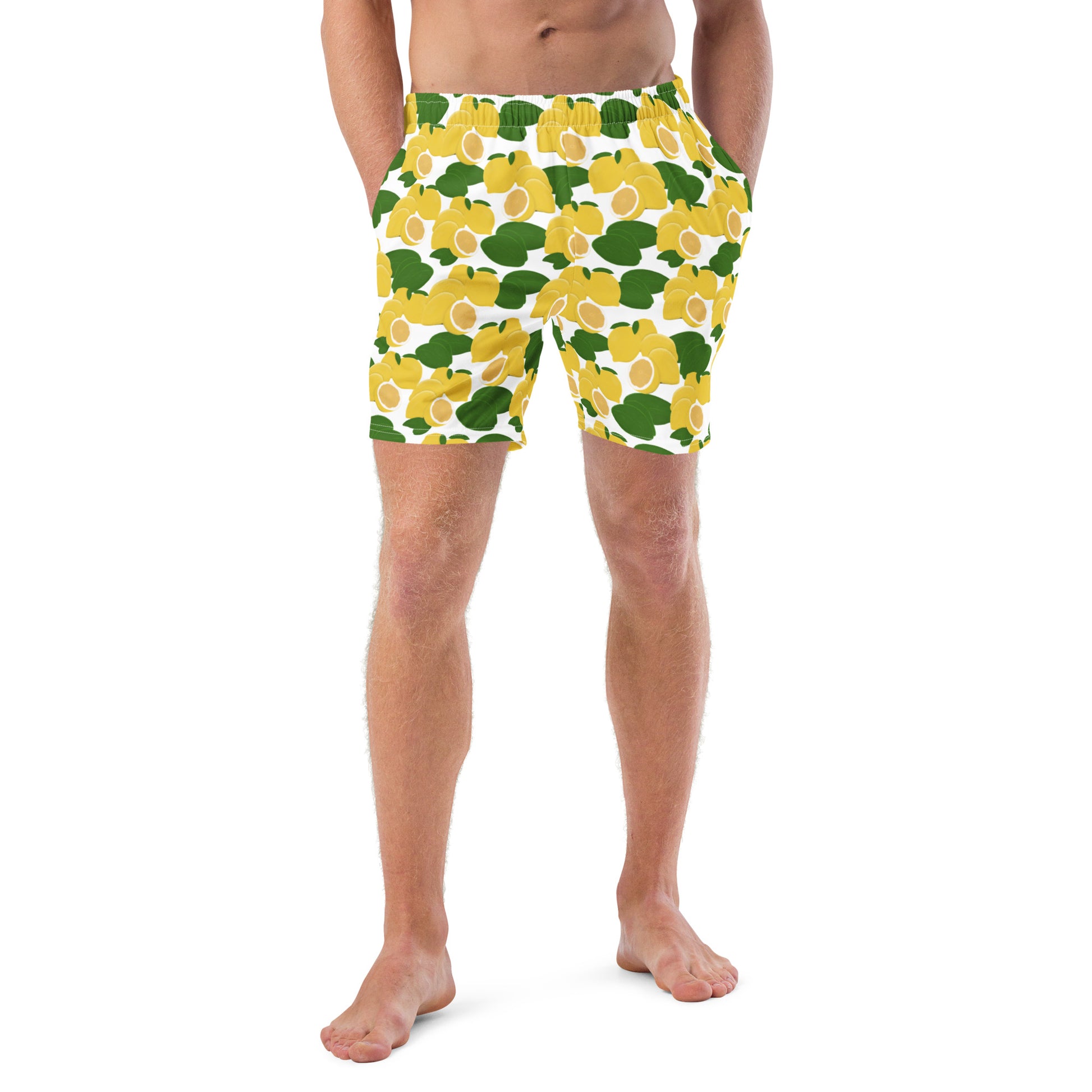 front view of model wearing citrus lemon swim trunks