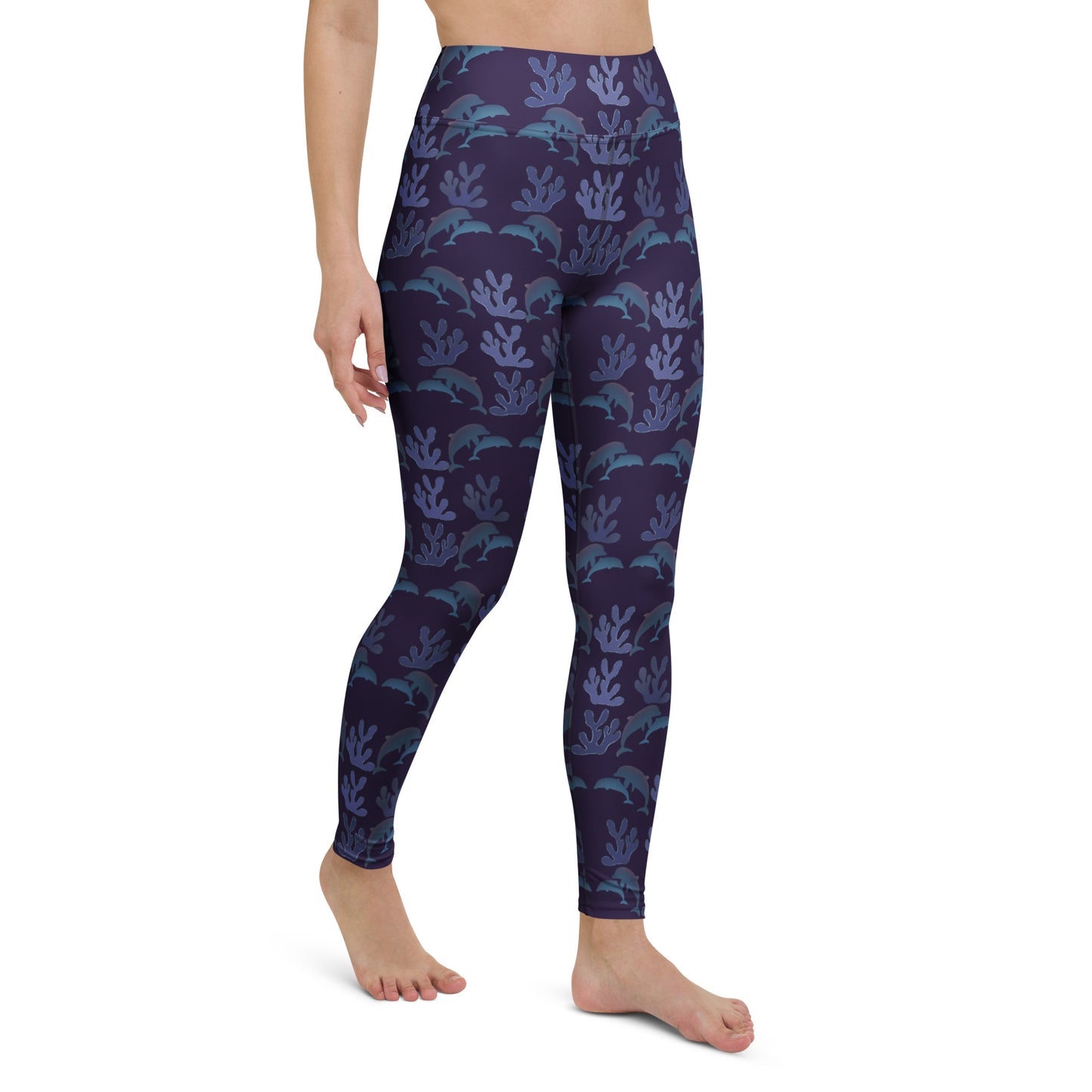 right front view of model wearing coral reef dolphins yoga leggings