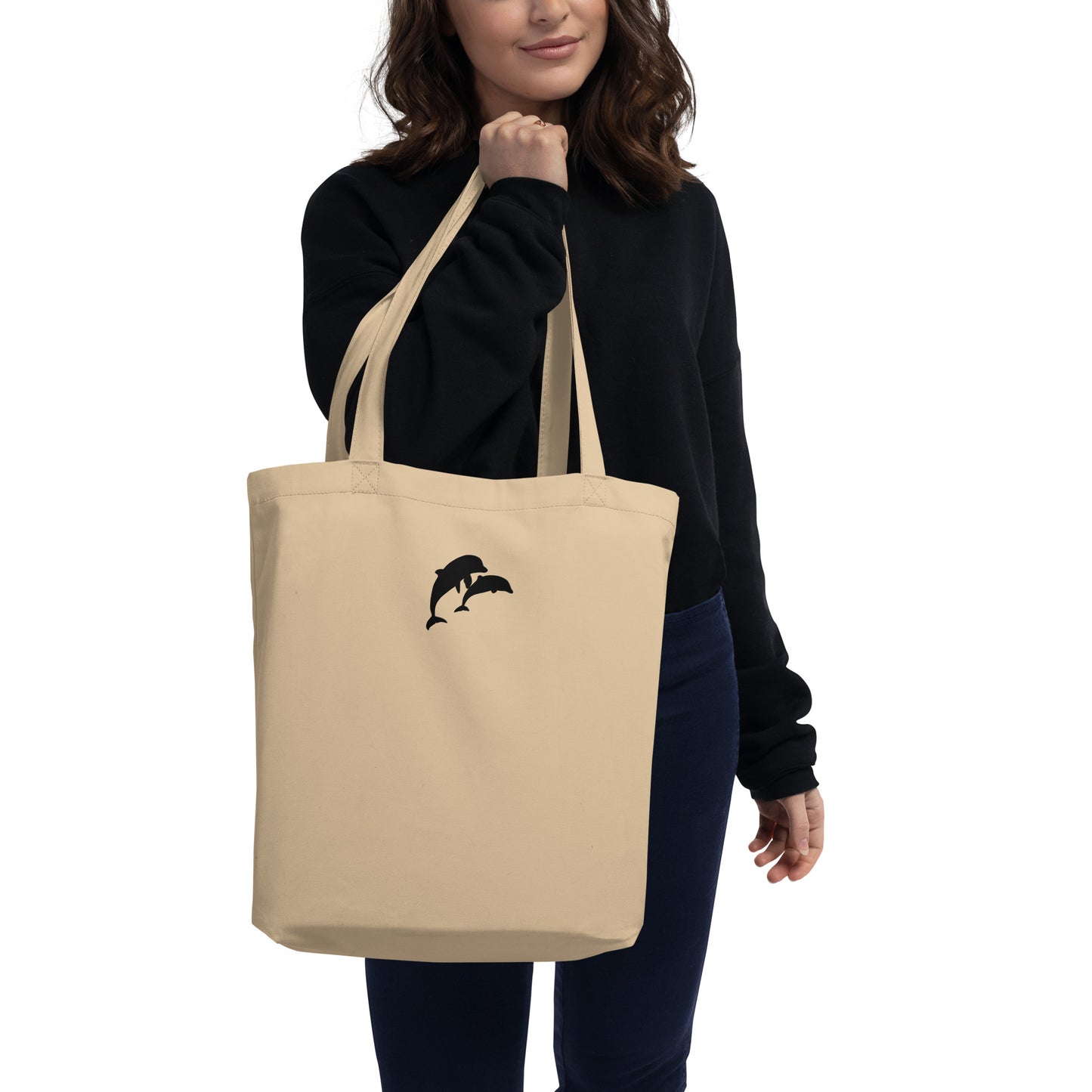 model carrying dolphins eco tote bag in black