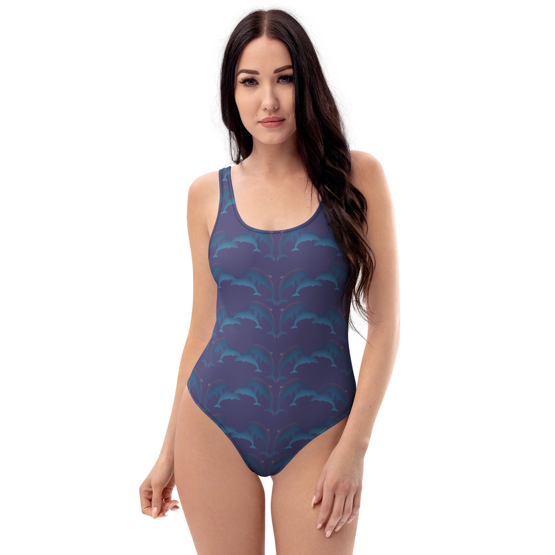  front view of model wearing dolphins one piece swimsuit in deep blue