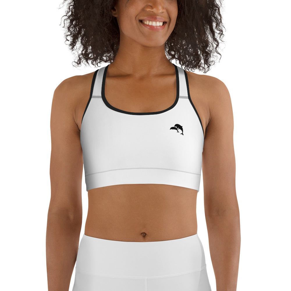  front view of model wearing dolphins wave cove logo sports bra in white