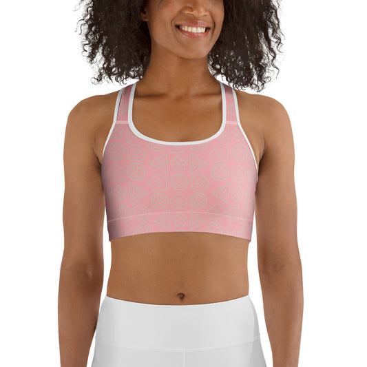 front view of model wearing floral geometric sports bra in pink