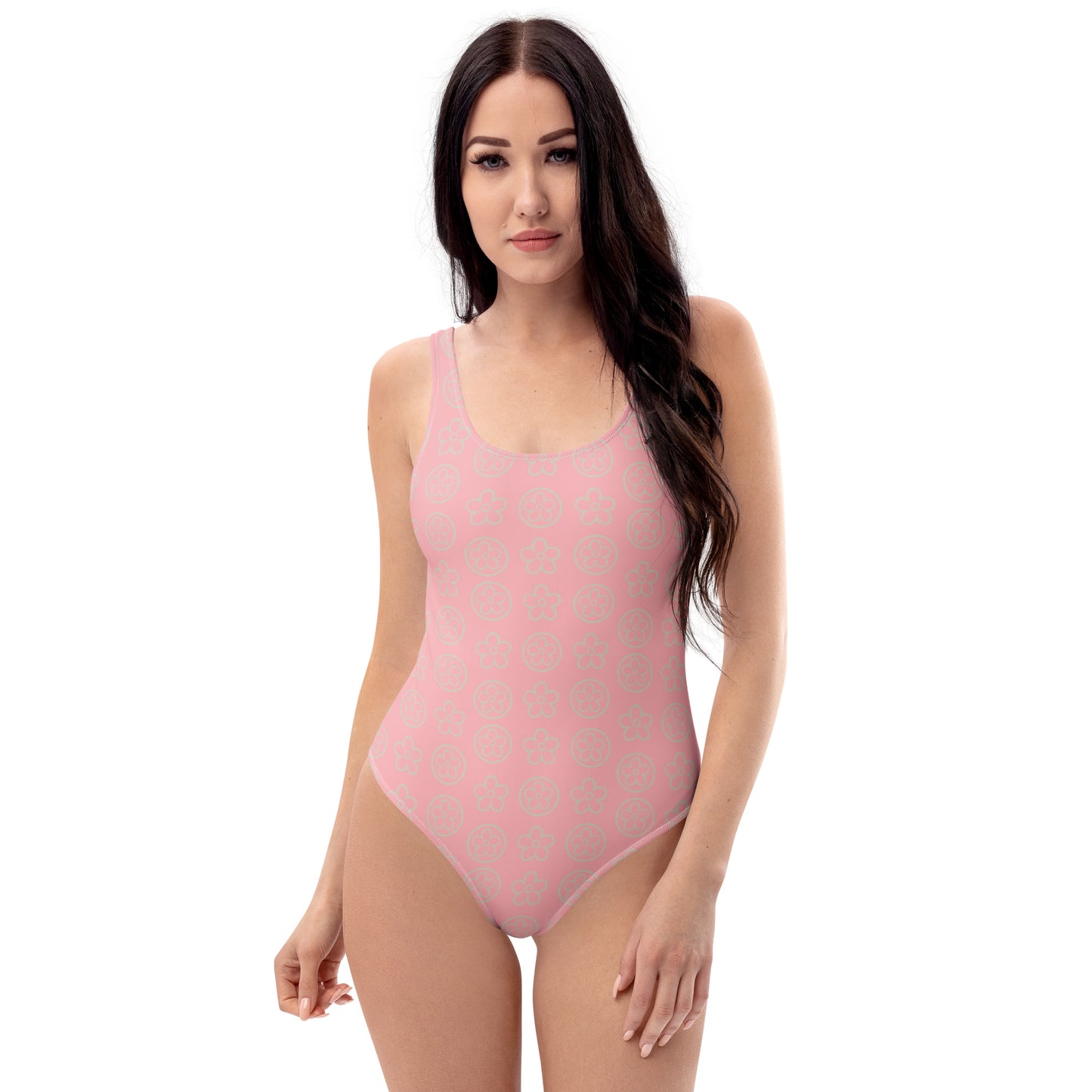 front view of model wearing pink rose floral one-piece swimsuit