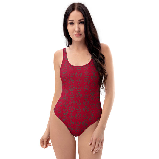 front view of model wearing red floral  pattern one-piece swimsuit 