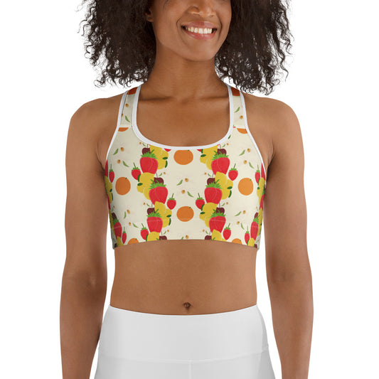front view of model wearing light yellow fruit cocktail sports bra