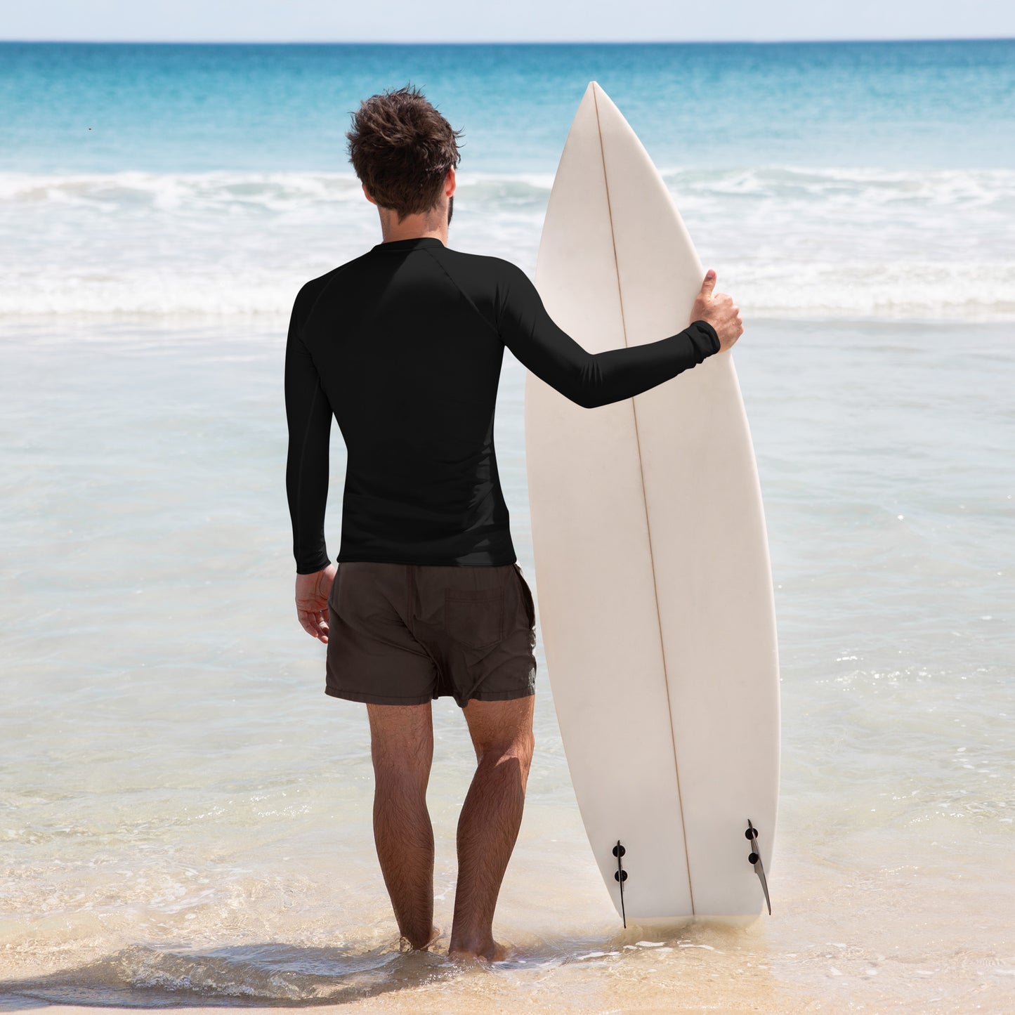 mens rash guard in black with surfboard