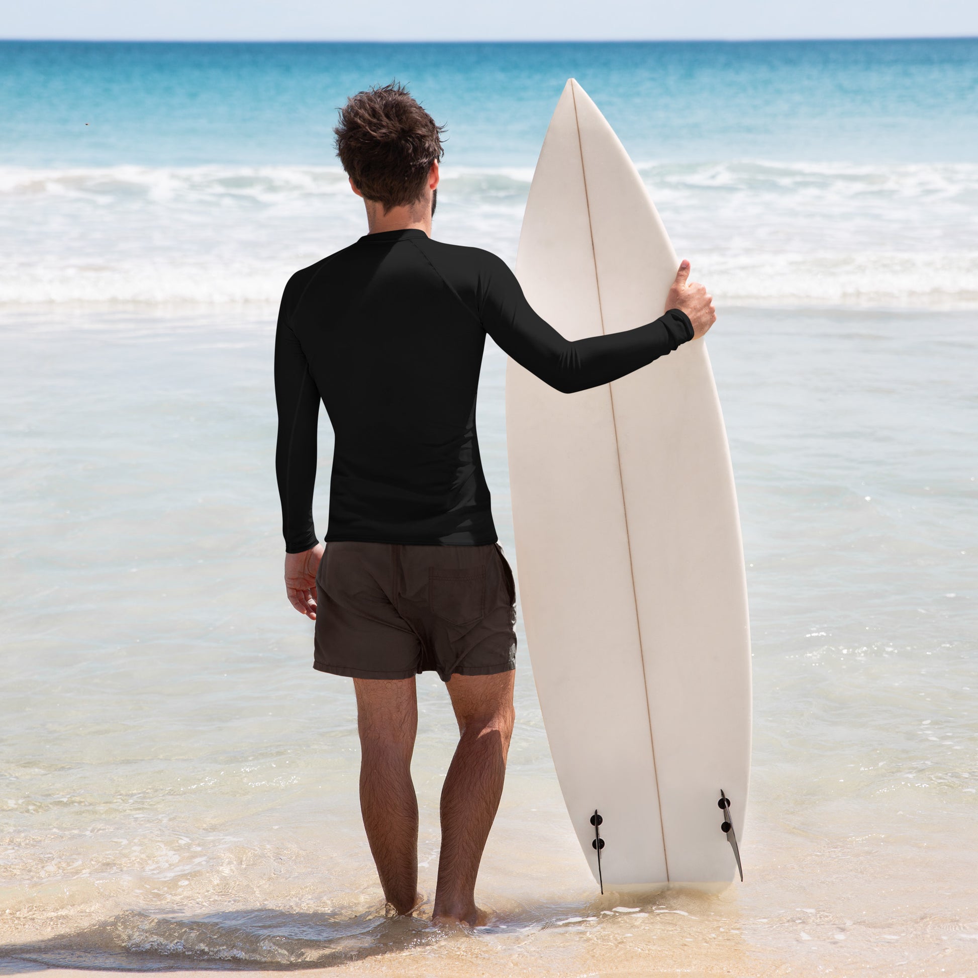 mens rash guard in black with surfboard