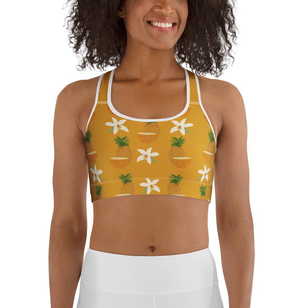  front view of model wearing pineapple sports bra in white