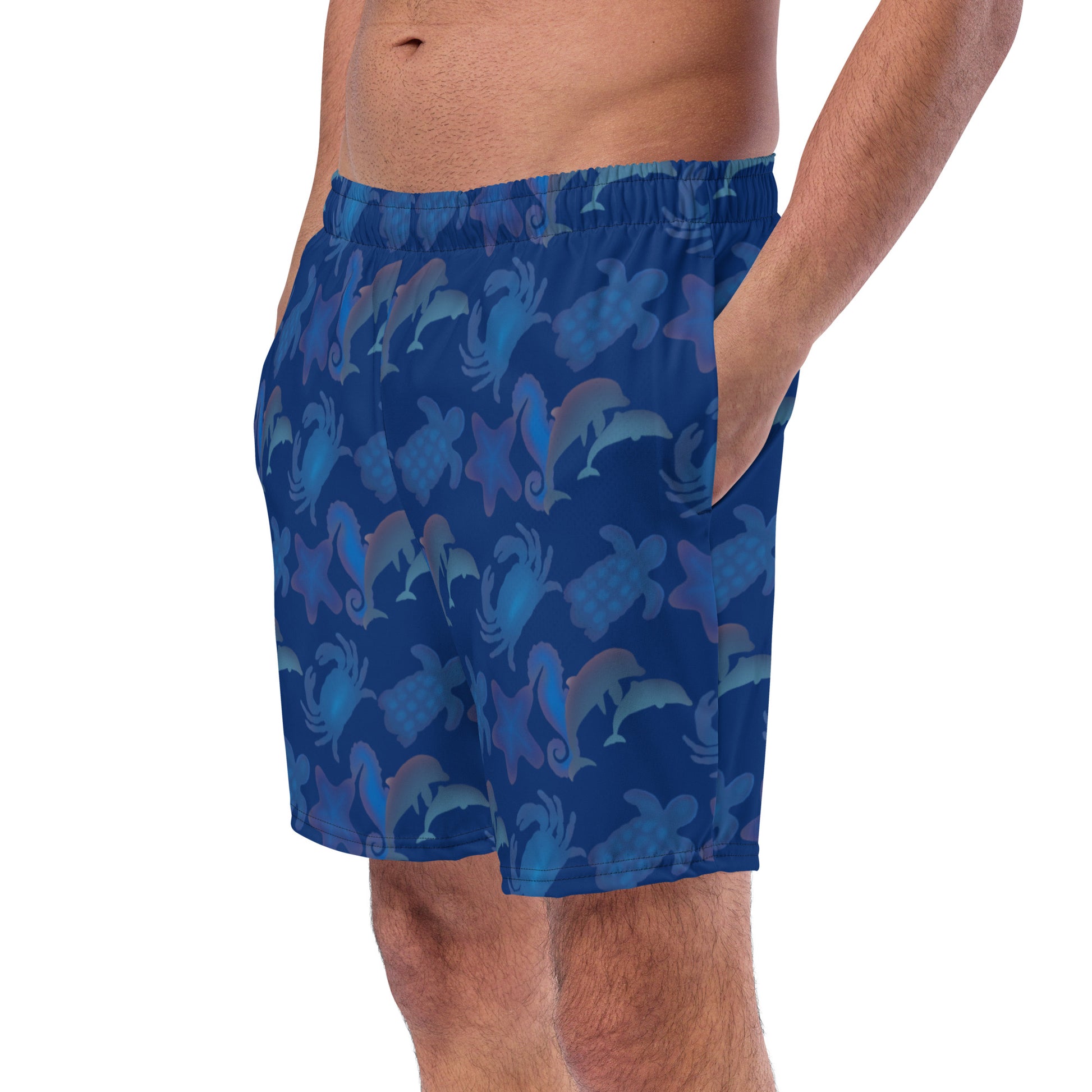 left front view of model wearing seascape swim trunks in navy