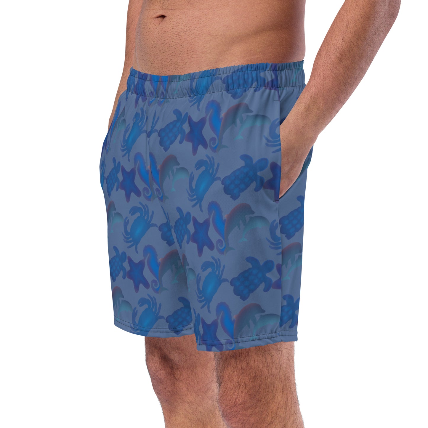 left front view of model wearing seascape swim trunks in slate blue