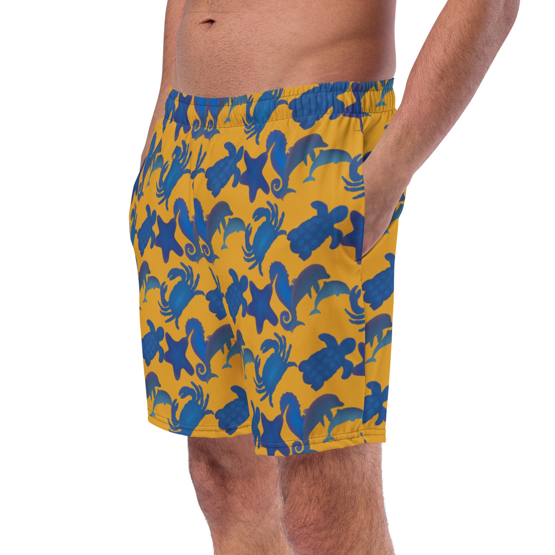 left front view of model wearing seascape swim trunks in yellow