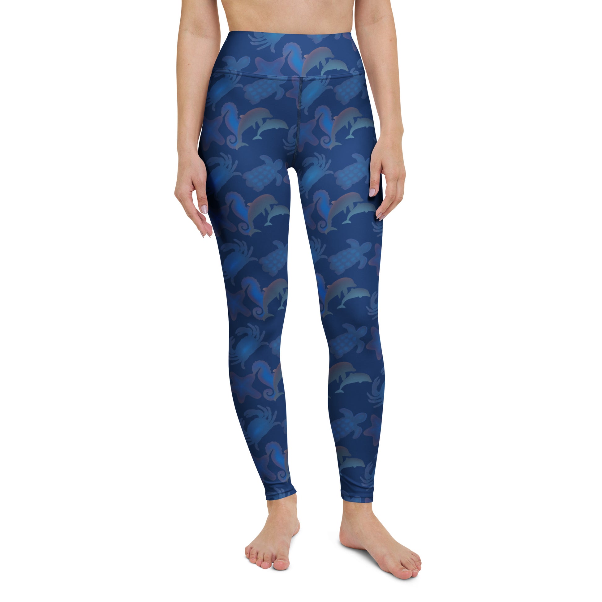 front view of model wearing seascape yoga leggings on navy