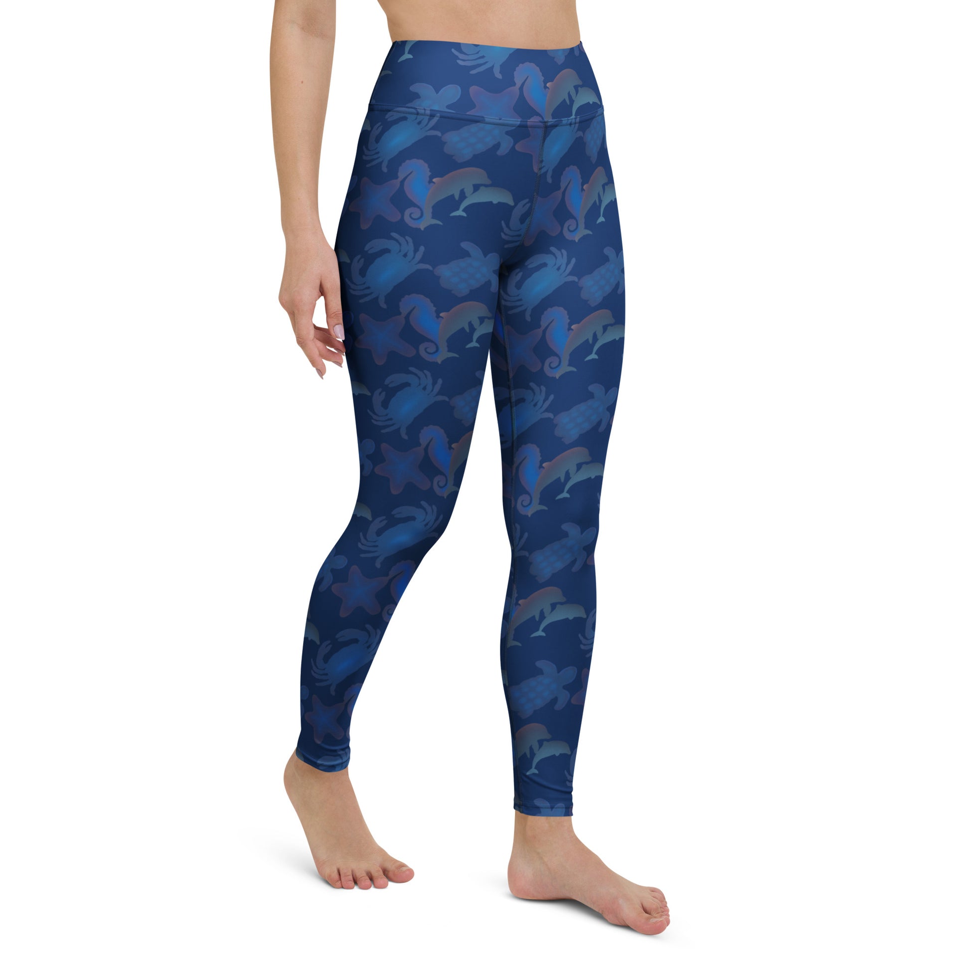 right front view of model wearing seascape yoga leggings on navy