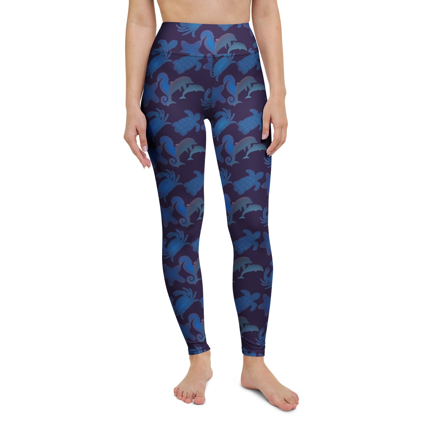 front view of model wearing seascape yoga leggings in purple