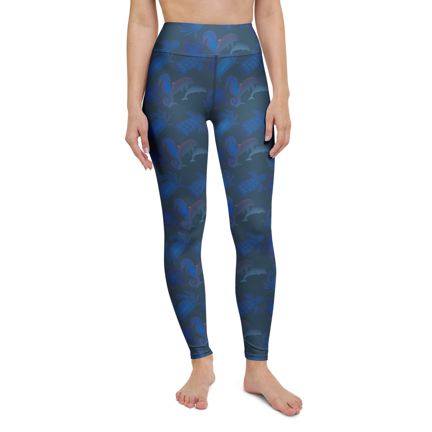 front view of model wearing seascape yoga leggings in green