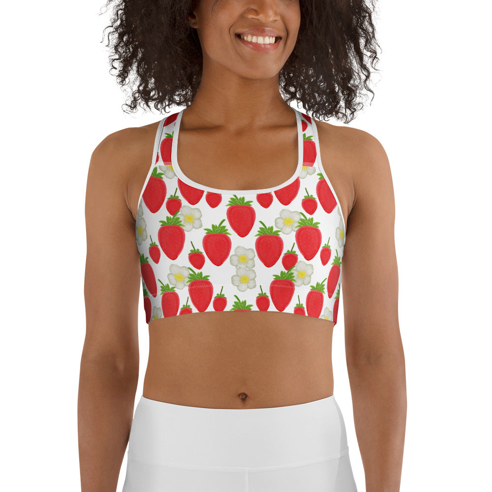  front view of model wearing strawberry sports bra in white
