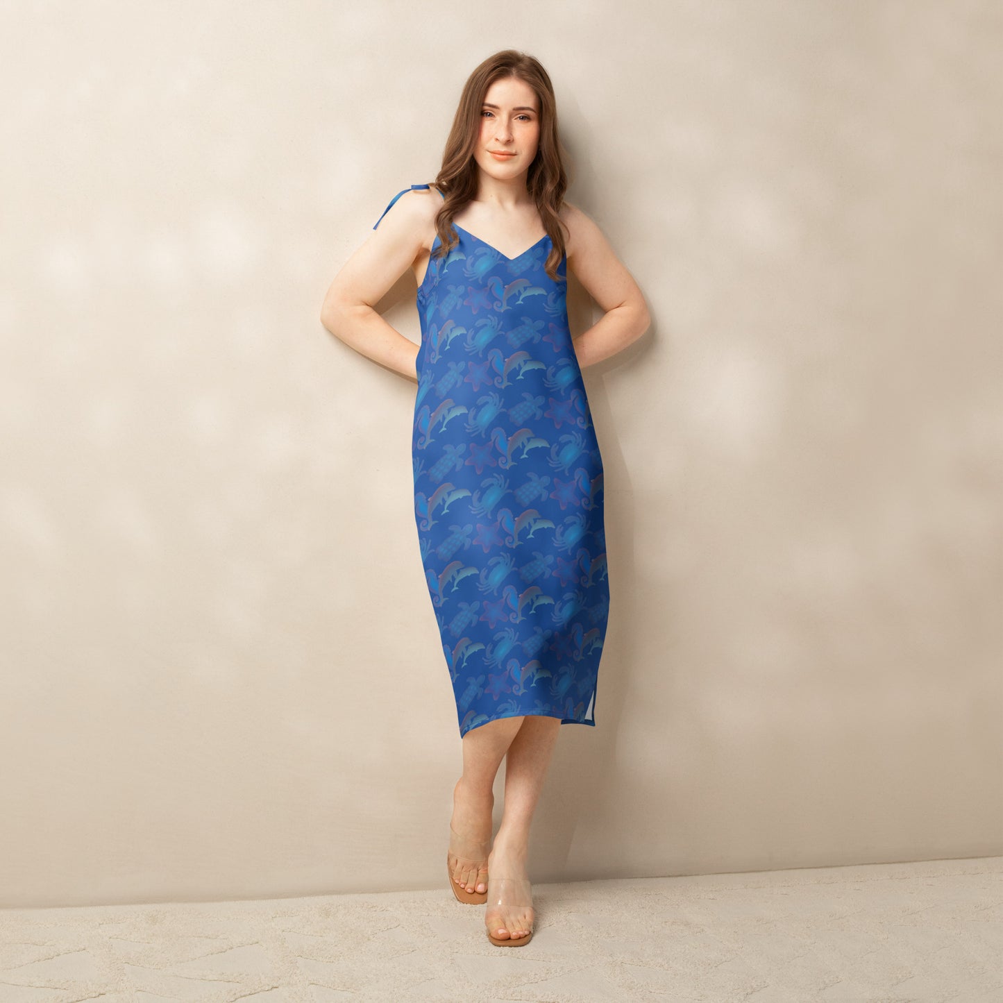 front view of model wearing navy seascape beach dress 