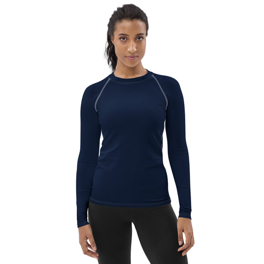 front view of model wearing navy rash guard